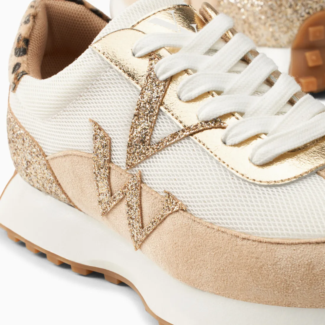 Baskets monogramme Faustine ivoire et beige à semelle running